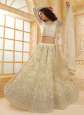 Ivory White Thread Embroidery Traditional Lehenga Choli And Dupatta