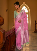 Pink And Green Weaved Crape Silk Saree