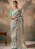 Grey And Teal Floral Munga Silk Saree