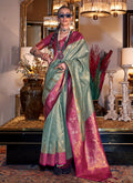 Pink And Teal Handloom Tissue Silk Saree