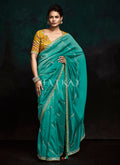 Turquoise And Yellow Handwork Tissue Silk Saree