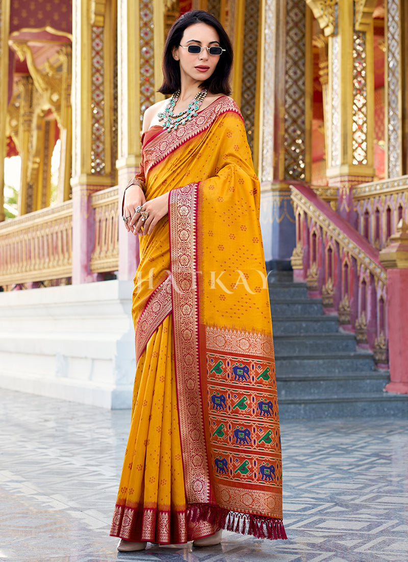 Yellow and Orange Ikat Printed Patola Silk Saree