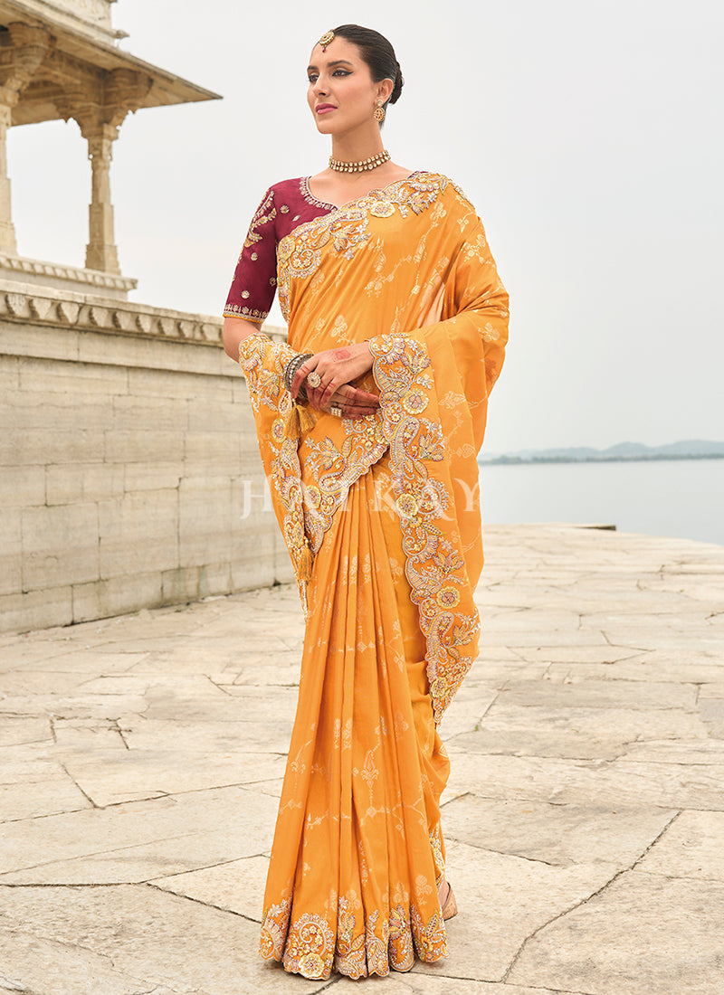 Golden Yellow And Maroon Multi Embroidery Saree