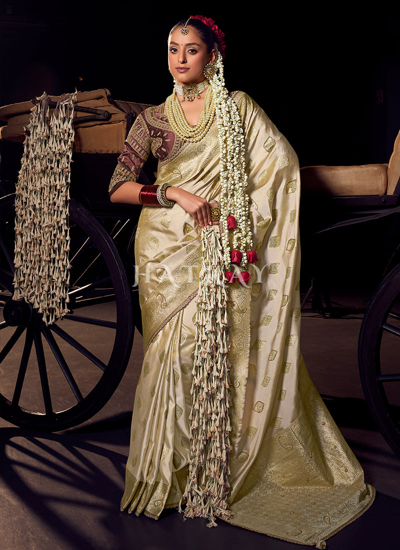 Cream And Mauve Handwork Tissue Silk Saree